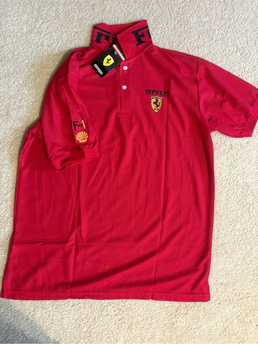 New with tag (sz XL FIT L )Ferrari Navy Polo with Yellow Shield and Red Accents
